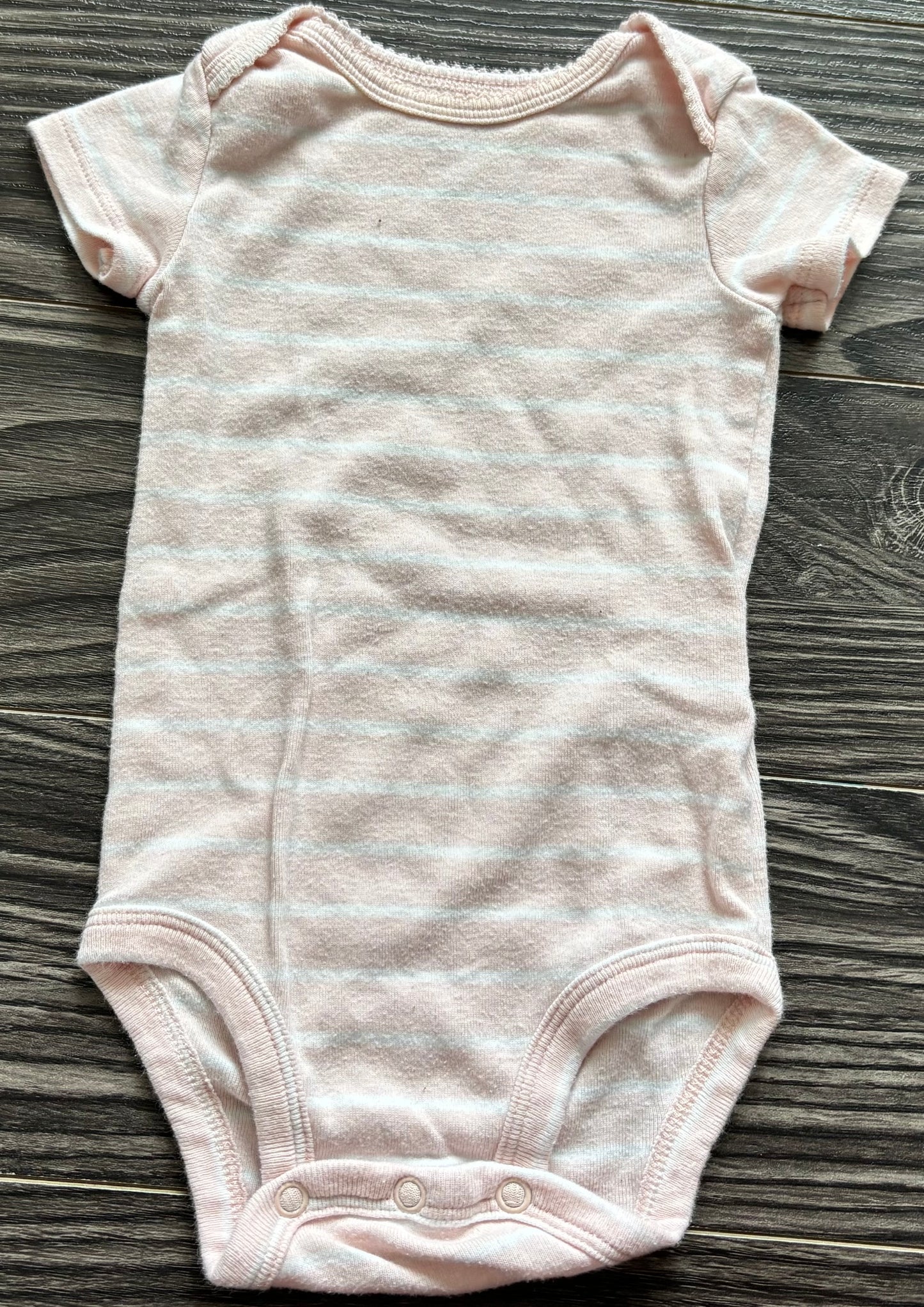 Cache couche Carter’s 6 mois