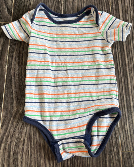 Cache couche 6-9 mois