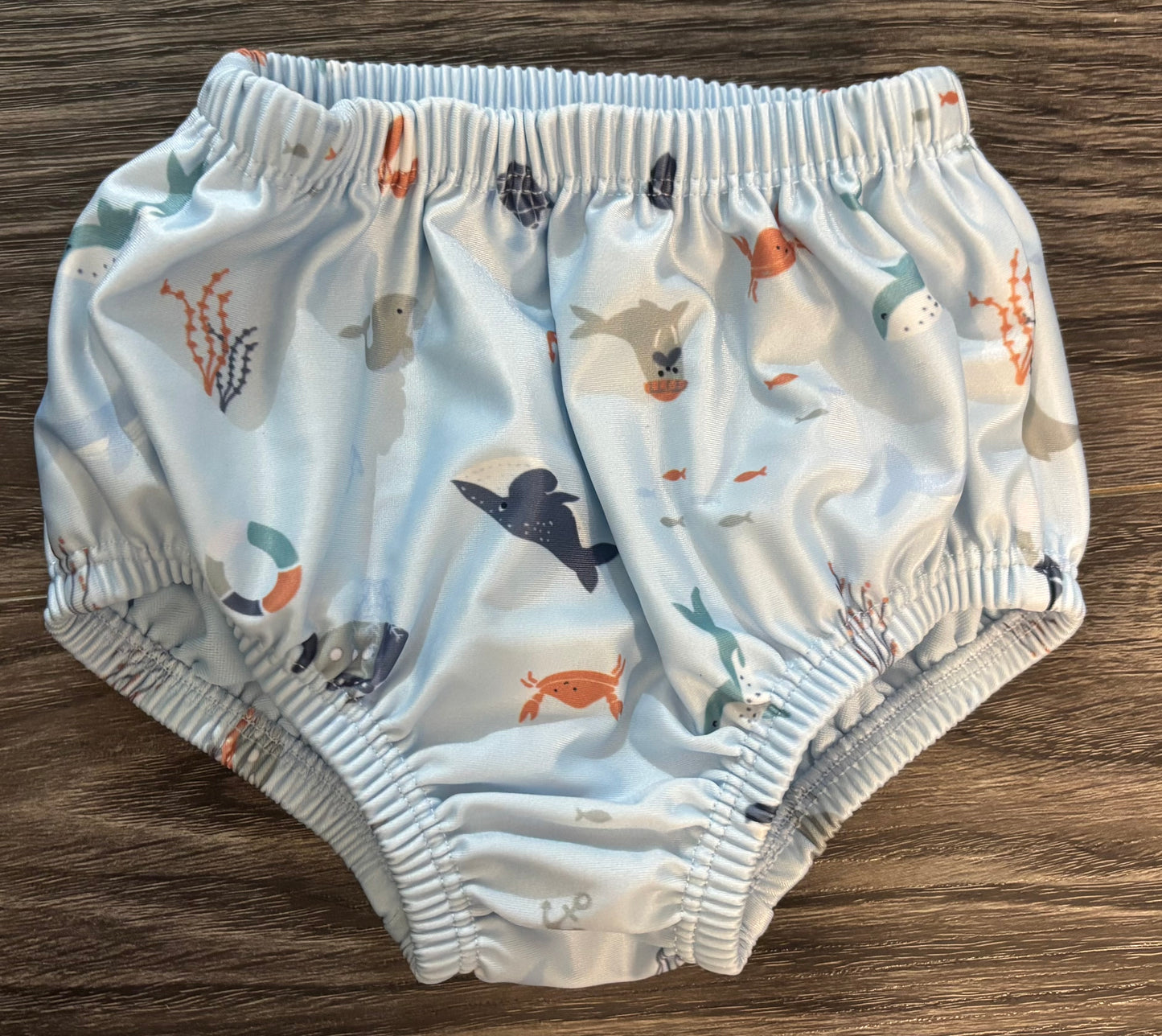 Couche de piscine 9-12 mois