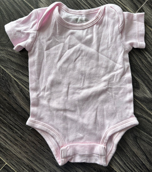 Cache couche Kirkland 0-3 mois