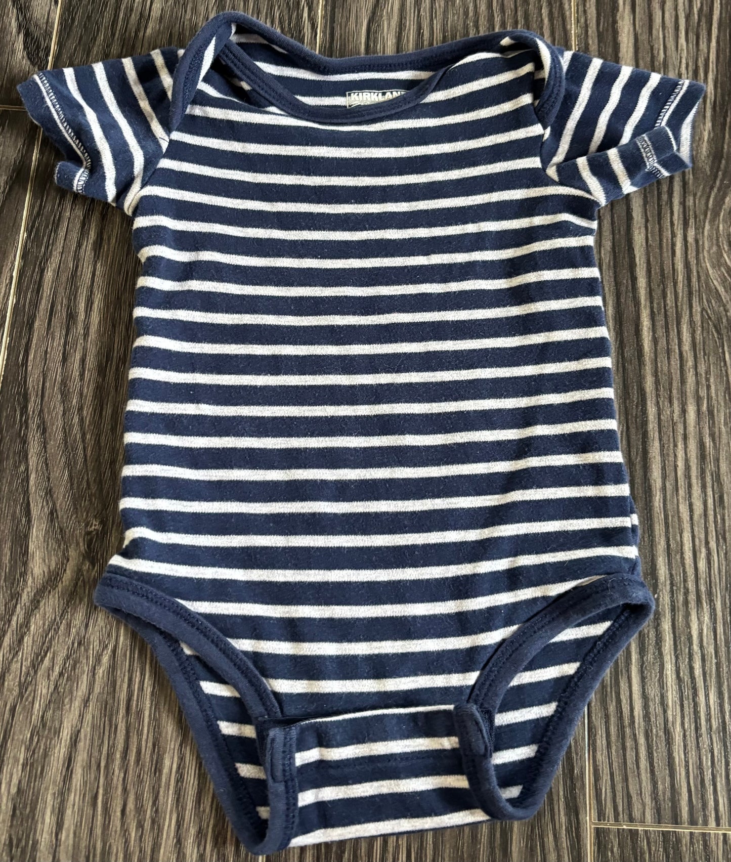 Cache couche 6-9 mois