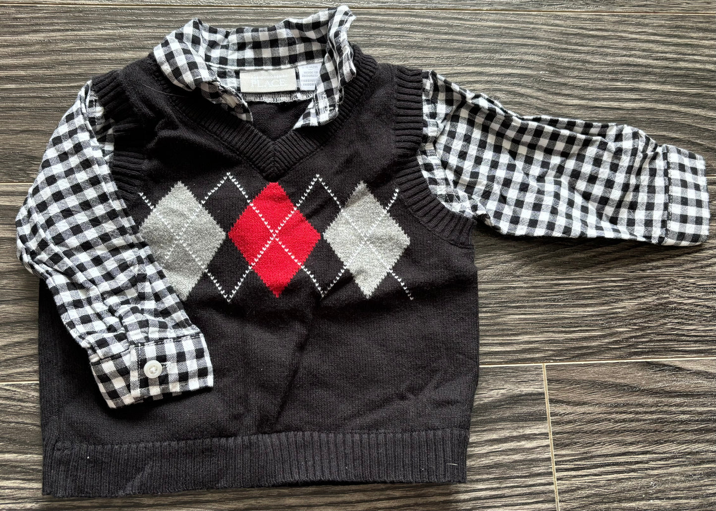 Chandail The children place 6-9 mois