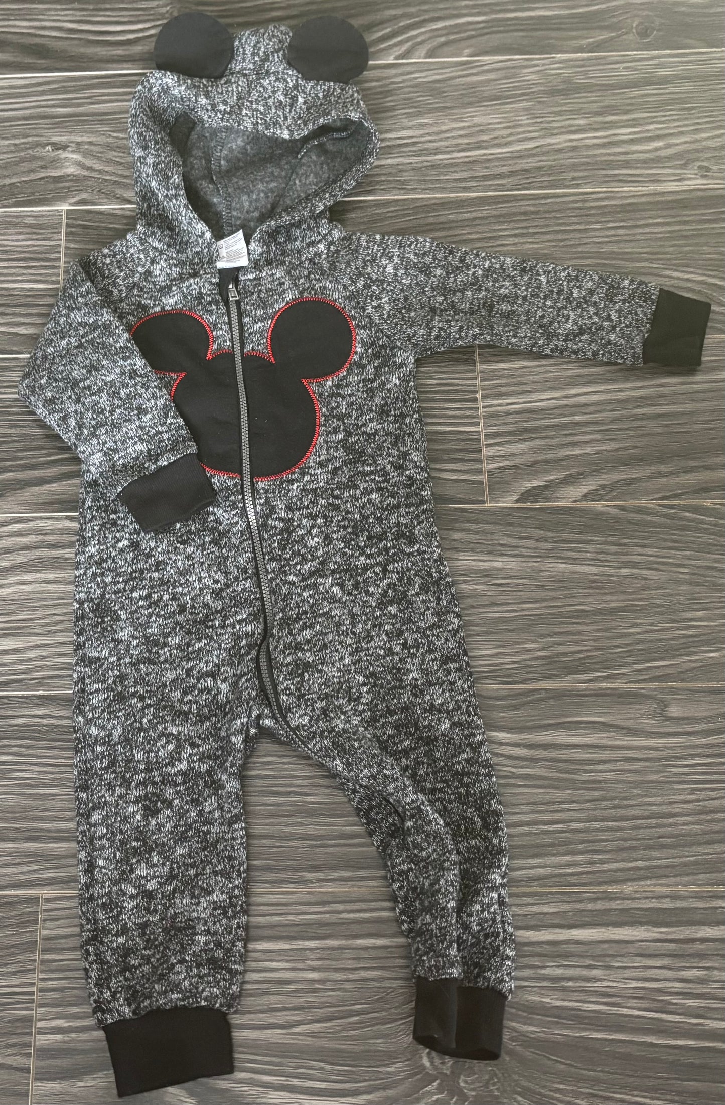 One piece Disney baby 6-12 mois